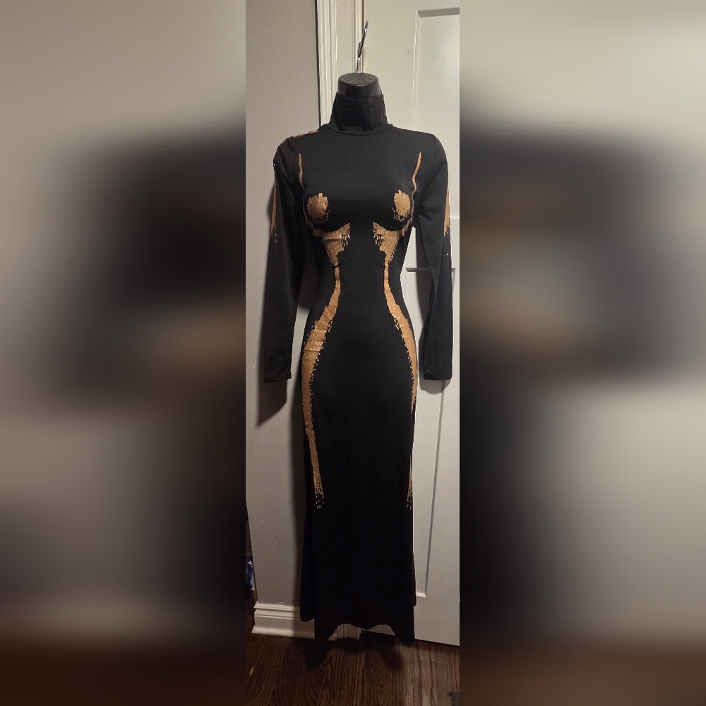 Long Sleeve Black Maxi Dress with Gold Sculptural Accents